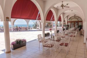 Restoran või mõni muu söögikoht majutusasutuses Collection O Hotel Mocambo, Boca del Río