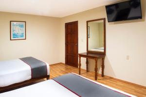 Voodi või voodid majutusasutuse Collection O Hotel Mocambo, Boca del Río toas