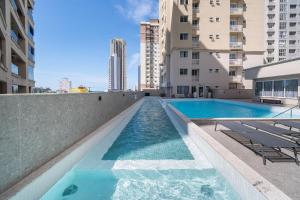 Swimmingpoolen hos eller tæt på Achei Itapema • 3 Quartos + Piscina e vista linda