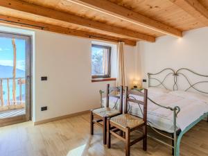 Katil atau katil-katil dalam bilik di Holiday Home Baita Mirtillo by Interhome