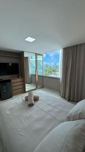 Ένα ή περισσότερα κρεβάτια σε δωμάτιο στο Flat luxury hotel cove