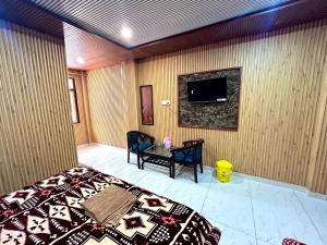 Televisyen dan/atau pusat hiburan di New Hotel Mahadev