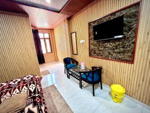Televisyen dan/atau pusat hiburan di New Hotel Mahadev