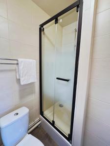 Ванная комната в L'Escale Appartements et Suites en bord de Mer