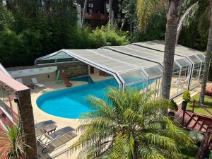 an overhead view of a swimming pool with a canopy at Carilo Princess in Carilo