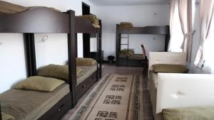 Postel nebo postele na pokoji v ubytování Apple Hostel Bishkek