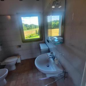 Koupelna v ubytování Agriturismo borgo del mincio + 37 fotografií