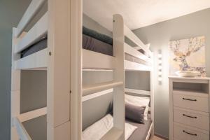 Postel nebo postele na pokoji v ubytování Feriendorf Wallenburg