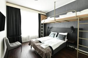 Postel nebo postele na pokoji v ubytování K7 Hotel Oslo