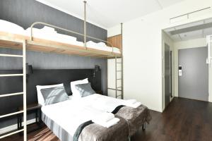 Postel nebo postele na pokoji v ubytování K7 Hotel Oslo
