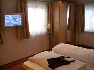 Voodi või voodid majutusasutuse Hotel Stülzis toas