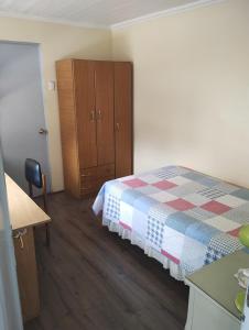 Postel nebo postele na pokoji v ubytování Ñuñoa Vive 1