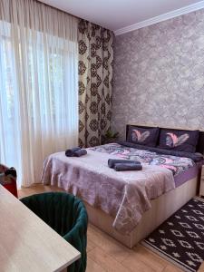 Ένα ή περισσότερα κρεβάτια σε δωμάτιο στο Nova city center apartments