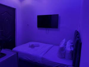 Rúm í herbergi á VHS Vinchee Suites