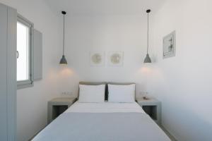 Voodi või voodid majutusasutuse White Loft toas