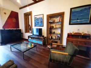 Televiisor ja/või meelelahutuskeskus majutusasutuses Villa Turtle tropicale - private pool