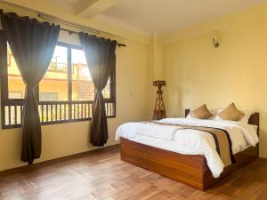 Katil atau katil-katil dalam bilik di Zen Nest Hotel