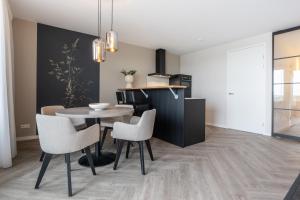 Una cocina o zona de cocina en Résidence Marina 29 fotos más