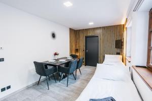 Katil atau katil-katil dalam bilik di Apartmány U Doskočilů