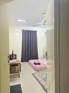 Letto o letti in una camera di BlessyWail Homestay