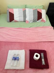 Letto o letti in una camera di BlessyWail Homestay