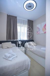 Postel nebo postele na pokoji v ubytování Casa Indigo Ivan Luxury Homes 9ªPlta Sur 1ªLinea