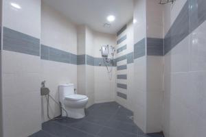 Koupelna v ubytování OYO 90380 Hotel Jasin
