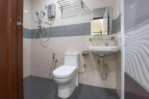 Koupelna v ubytování OYO 90380 Hotel Jasin