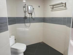 Koupelna v ubytování OYO 90380 Hotel Jasin