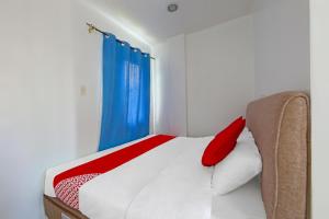 Postel nebo postele na pokoji v ubytování Loveness Apartelle