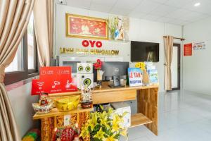 TV a/nebo společenská místnost v ubytování Linh Dan Bungalow
