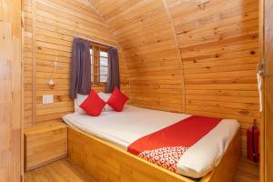 Postel nebo postele na pokoji v ubytování Linh Dan Bungalow