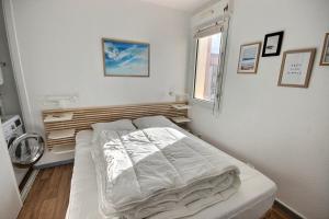 Postel nebo postele na pokoji v ubytování Appartement rénové proche plage de la centrale