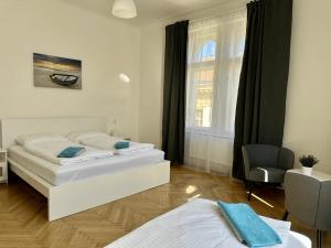 Postel nebo postele na pokoji v ubytování Welcome Hostel & Apartments Praguecentre
