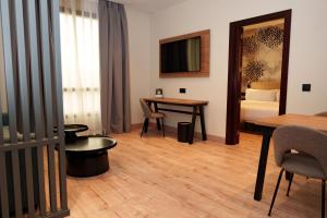 A bed or beds in a room at Sercotel Princesa De Eboli