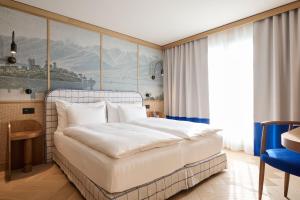Postel nebo postele na pokoji v ubytování Sorell Hotel Speer