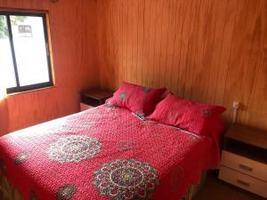 Postel nebo postele na pokoji v ubytování Hostal Huepil
