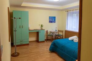 Kuchyň nebo kuchyňský kout v ubytování Avernum Relais Hotel e Ristorante
