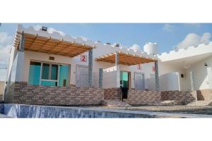 Πισίνα στο ή κοντά στο Super OYO 150 Reef Al Khaleej Resort