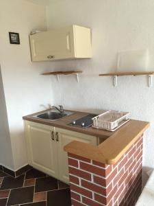 Η κουζίνα ή μικρή κουζίνα στο Štanjelski Razgledi AR +21 φωτογραφίες