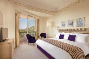 Postel nebo postele na pokoji v ubytování Es Saadi Marrakech Resort - Hotel