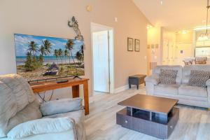 a living room with two couches and a table at Spacious 2 BR Condo-Golf Course Views! River Oaks 65-M in Myrtle Beach