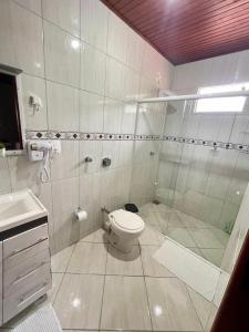 Ένα μπάνιο στο Kitnet Espaço Aconchego