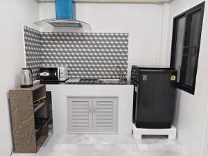 Η κουζίνα ή μικρή κουζίνα στο 629 Home for rent, Rawai