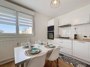 Η κουζίνα ή μικρή κουζίνα στο Appartement Cosy Florange