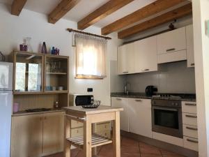 Kuchyňa alebo kuchynka v ubytovaní Casa Vela