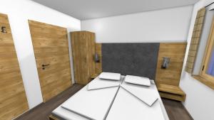 ein Raum mit zwei weißen Tischen und Holzwänden in der Unterkunft Boderhof Apartments in Tux