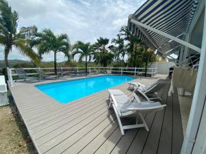 Πισίνα στο ή κοντά στο Villa la Flamboyante 4 étoiles, 4 Clévacances