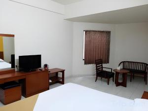 TV/Unterhaltungsangebot in der Unterkunft Super OYO Townhouse OAK Hotel Fiducia Serpong