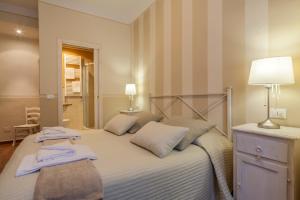 Llit o llits en una habitació de Soggiorno Pezzati